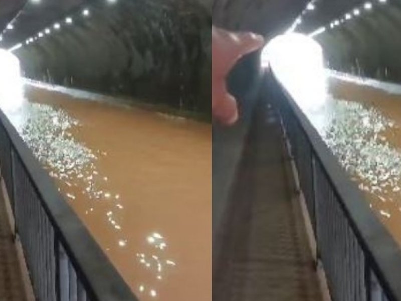 Imagem de Chuva transforma túnel em 'rio' e impede passagem de veículos na Av. Pinto de Aguiar; veja vídeo