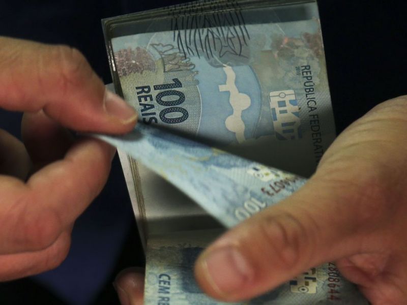 Imagem de Caixa paga Auxílio Brasil a cadastrados com NIS final 7